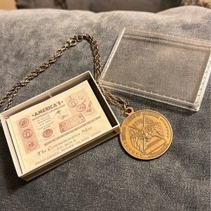 The commemorative mint necklace
